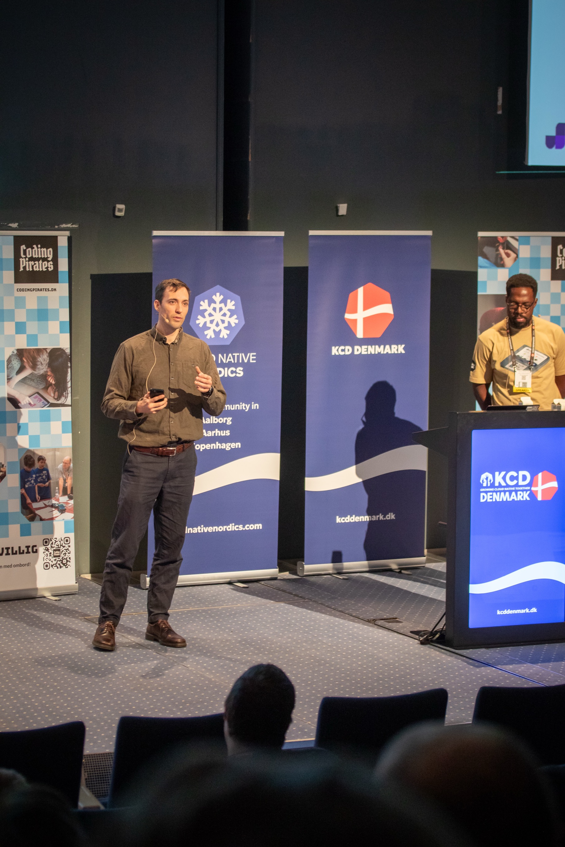 Gustav Rasmussen presenting on stage at KCD Denmark 2024